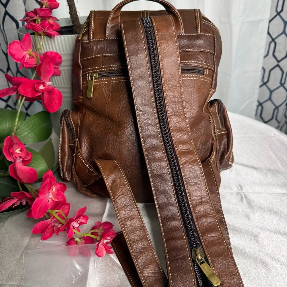 Brown Leather Backpack with Gold Accents